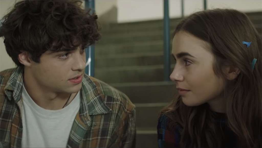 Noah Centineo Cozies Up To Lily Collins, gör regidebut med ARTY Music Video